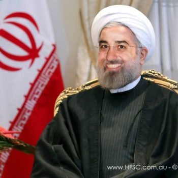 Iran's President Hassan Rouhani at a meeting with Syria's Prime Minister Wael Nader al-Halqi at his office in Tehran, Iran, Sunday, Dec. 1, 2013. Rouhani said his country has widely lobbied for humanitarian efforts aimed at reducing pains of Syrian, according to the presidential website. (AP Photo)